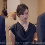 Nicole’s black cowl neck top and skirt set on The Paper