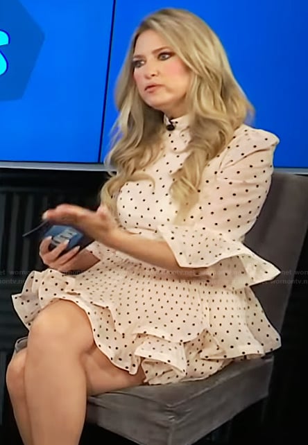 Nikki Novak’s white polka print mini dress on E! News