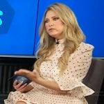 Nikki Novak’s white polka print mini dress on E! News