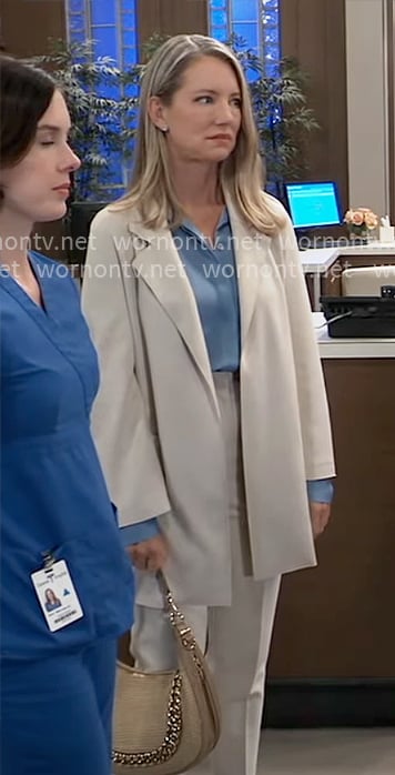 Nina's cream coat and blue blouse on General Hospital