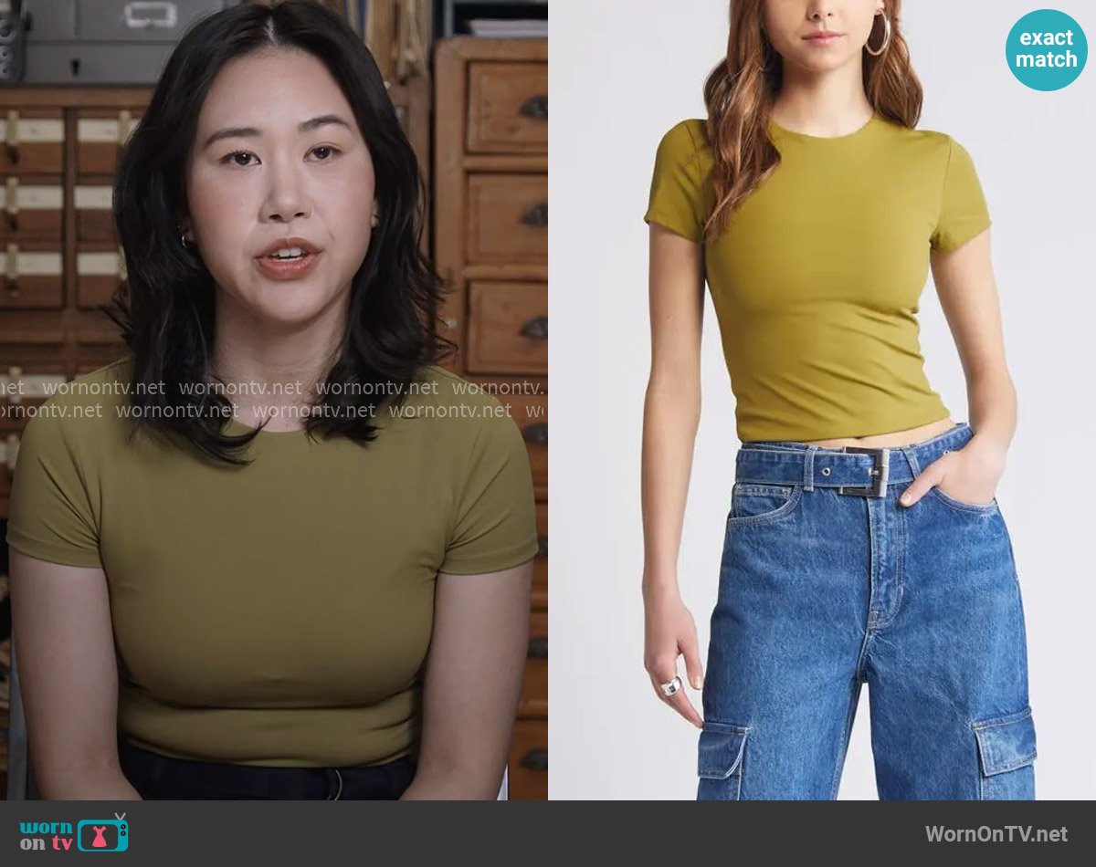 Open Edit Smooth Edit Short Sleeve Top in Olive Eyes worn by Nicole Lee (Ramona Young) on The Paper