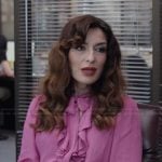 Esmerelda’s pink ruffle front blouse on The Paper