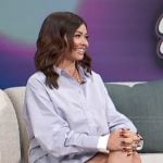 Sarah Hyland’s striped shirt and mini skirt on Access Hollywood