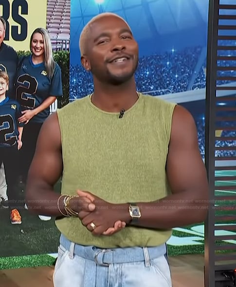 Scott’s knit vest and jeans on Access Hollywood