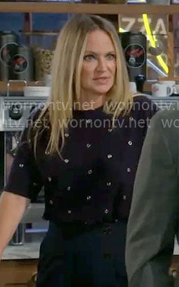 Sharon's navy grommet stud top on The Young and the Restless