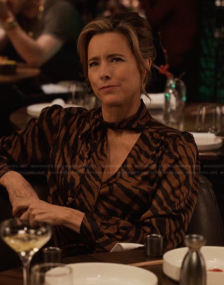 Sofia's animal print tie neck blouse on Only Murders in the Building