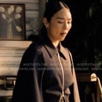 Stella’s navy flared sleeve jacket on The Morning Show
