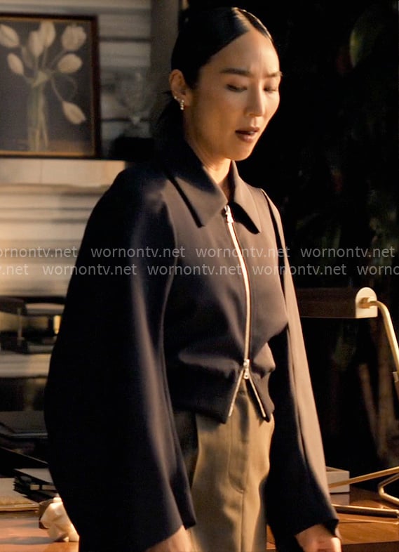 Stella's navy flared sleeve jacket on The Morning Show