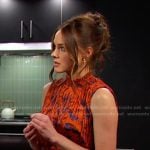 Stephanie’s orange printed pleated dress on Days of our Lives