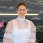 Stephanie’s white lace and sheer blouse on The Real Housewives of Miami