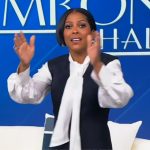 Tamron’s navy bubble dress on Tamron Hall Show