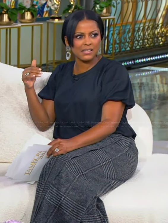 Tamron's black top and plaid pants on Tamron Hall Show