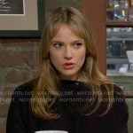 Tessa’s black button detail sweater on The Young and the Restless