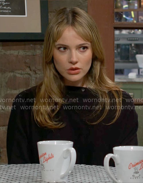 Tessa’s black button detail sweater on The Young and the Restless