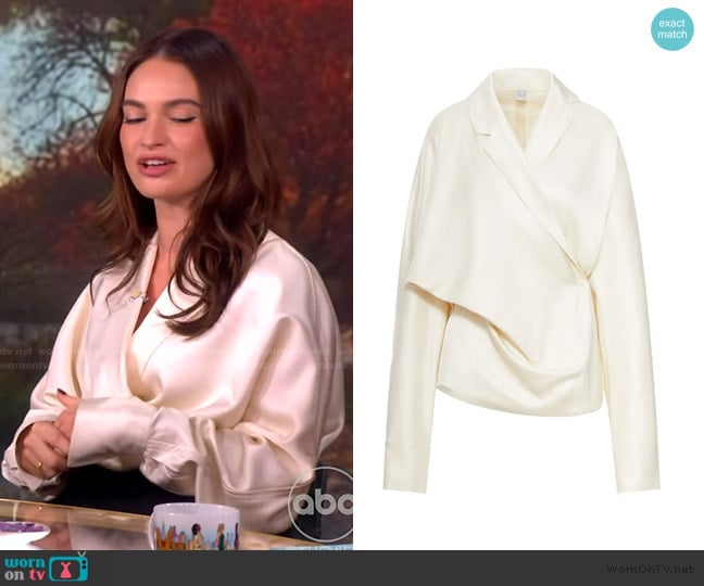 Toteme Off-White Wrap Blouse worn by Lily James on The View