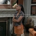 Trina’s black striped top with brown suede skirt on General Hospital