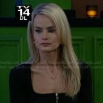 Vanessa’s black zip up square-neck jacket on Beyond the Gates