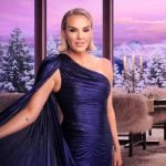 Whitney’s metallic one-shoulder promo dress on The Real Housewives of Salt Lake City