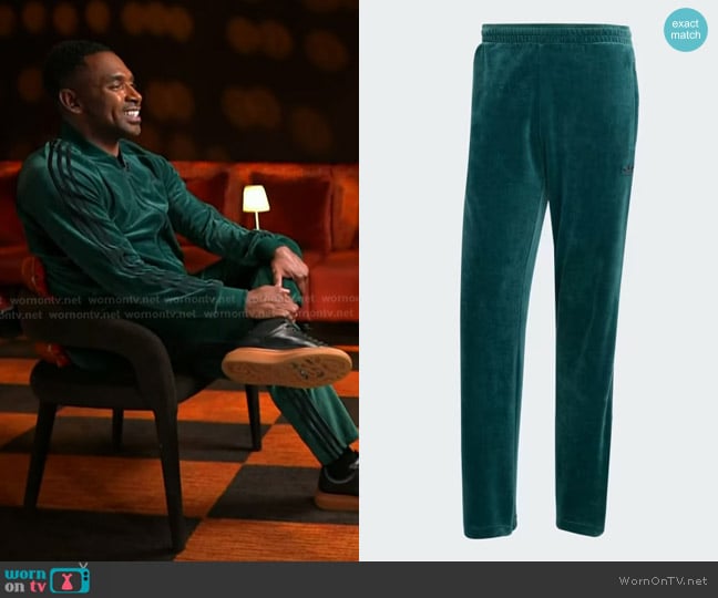 Adidas SST Adicolor Velour Track Pants in Aurora Ivy worn by Justin Sylvester on Today