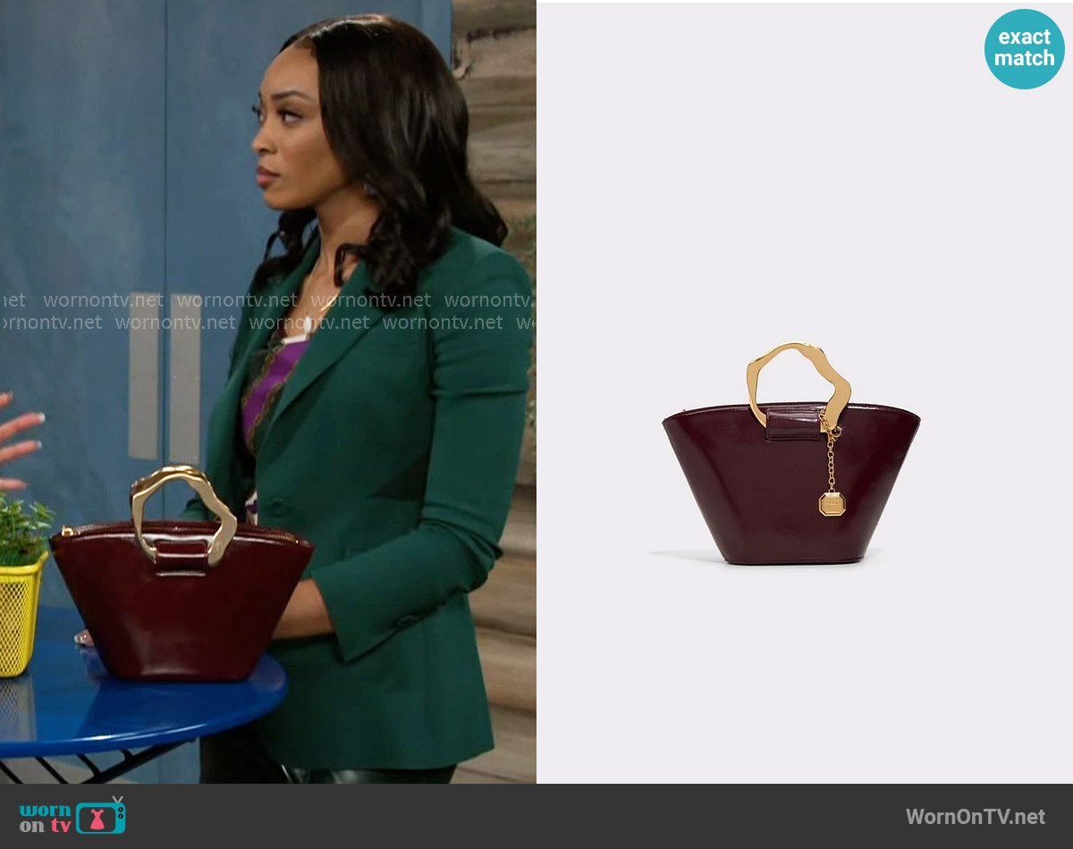 Aldo Goldenview Bordo Bag worn by Madison Montgomery (Kenjah) on Beyond the Gates