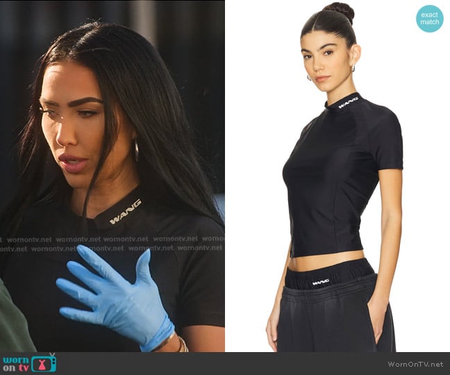 Bre’s black short sleeve top on Selling Sunset