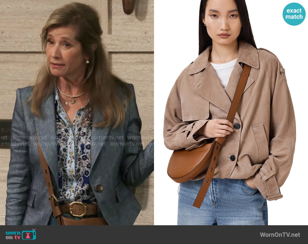 All Saints Half Moon Leather Crossbody Bag worn by Charlotte (Nancy Travis) on Shifting Gears