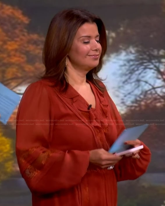 Ana's orange ruffle dress on The View