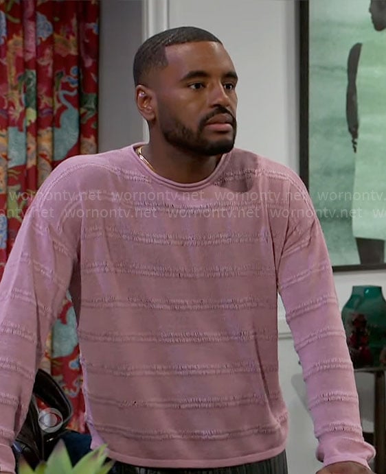 Andre’s pink textured stripe sweater on Beyond the Gates
