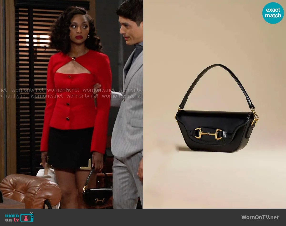 Anthropologie The Delilah Bag Horsebit Edition worn by Kat Richardson (Colby Muhammad) on Beyond the Gates