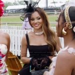 Ashley’s black ruffled mini dress on The Real Housewives of Potomac