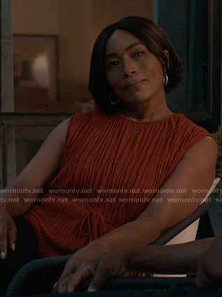 Athena's red pleated top on 9-1-1