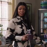 Ava’s black floral print shirtdress on Abbott Elementary