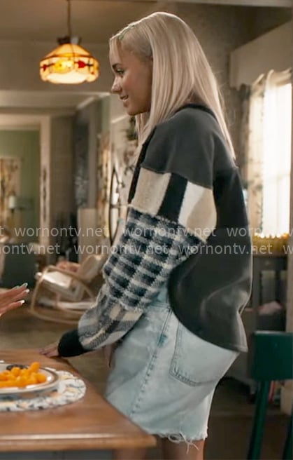 Ava’s patchwork sleeve sweater on High Potential