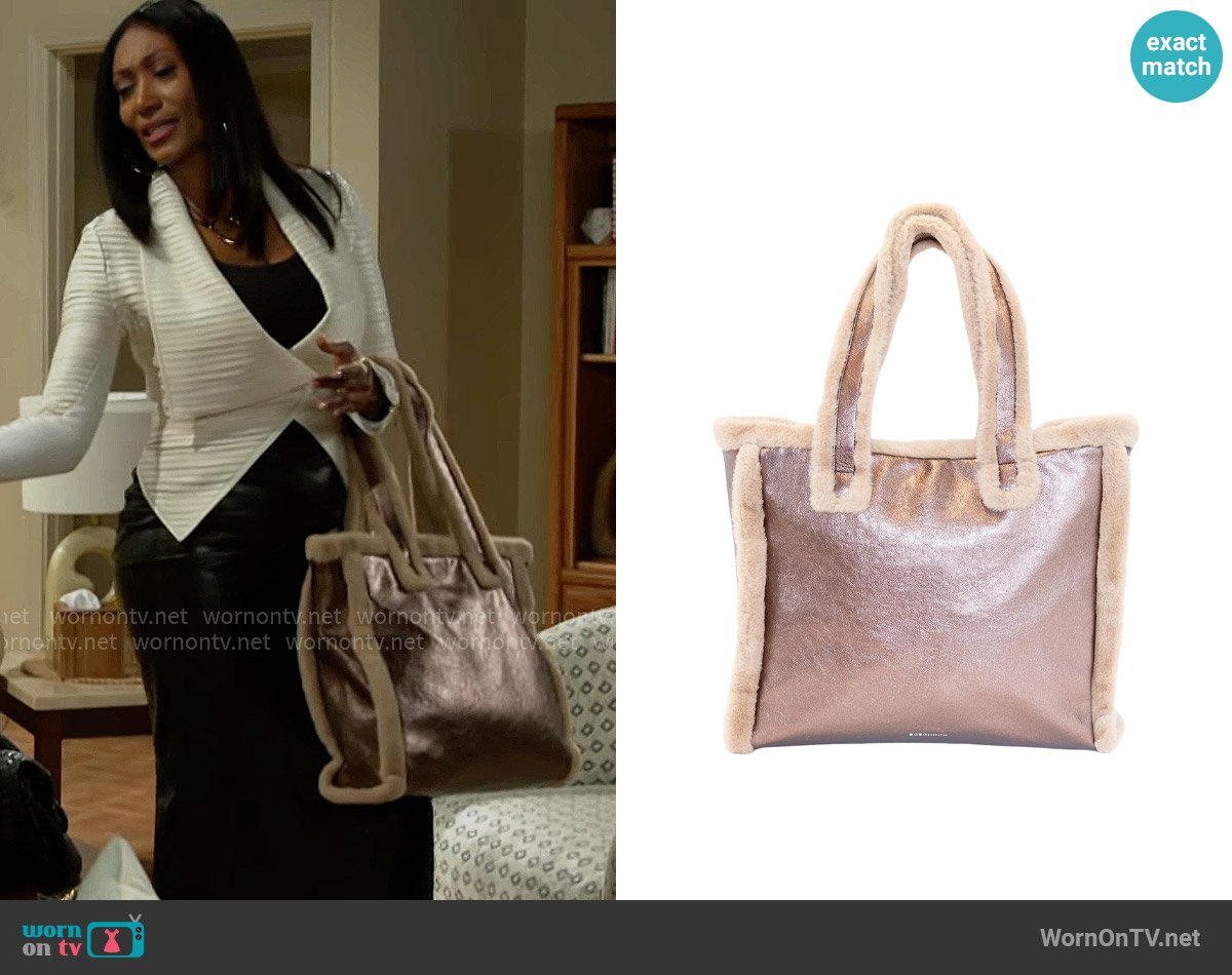 Leslie’s metallic bag on Beyond the Gates