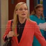 Belle’s orange blazer and pant suit on Days of our Lives