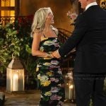 Amy Kaplan’s black floral ruched dress on The Golden Bachelor