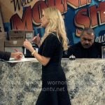 Bradley’s black flared hem dress on The Morning Show