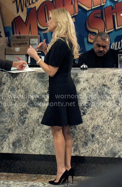 Bradley's black flared hem dress on The Morning Show