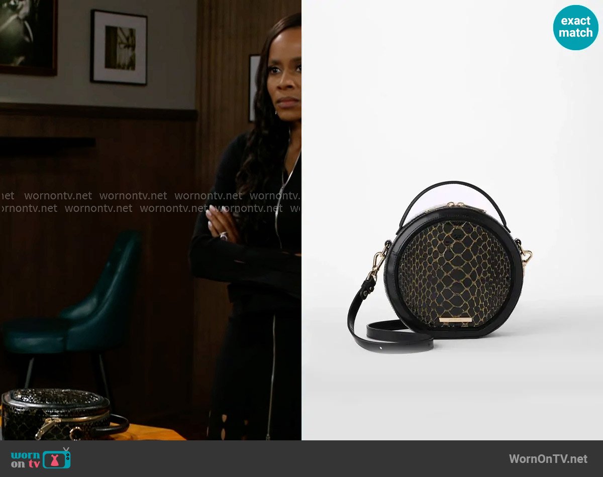 Brahmin Lane Bag in Black Cavatica worn by Hayley Lawson (Marquita Goings) on Beyond the Gates