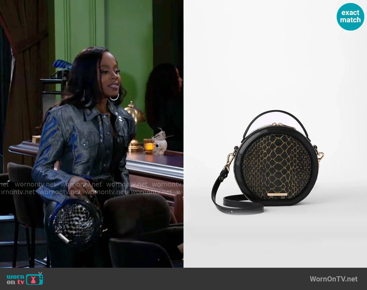 Brahmin Lane Bag in Black Cavatica worn by Hayley Lawson (Marquita Goings) on Beyond the Gates