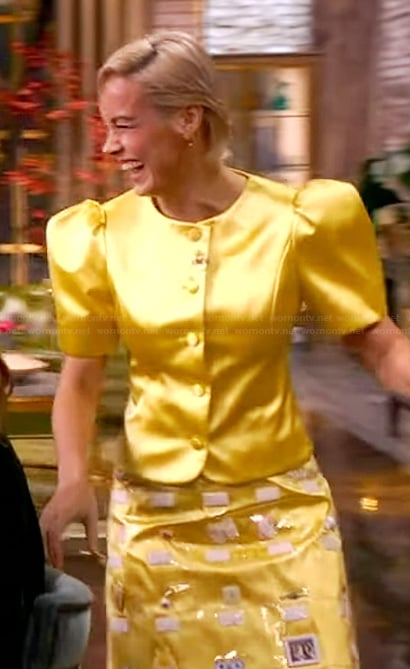 Brie Larson’s yellow satin top and skirt on The View