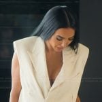 Bre’s ivory padded shoulder vest on Selling Sunset