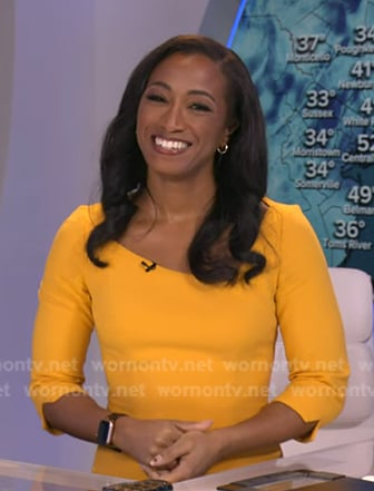 Brittany Bell's yellow asymmetric neck dress on Good Morning America