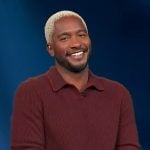 Scott’s red knit collared sweater on Access Hollywood