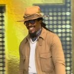 Cam Newton’s khaki jacket on Tamron Hall Show