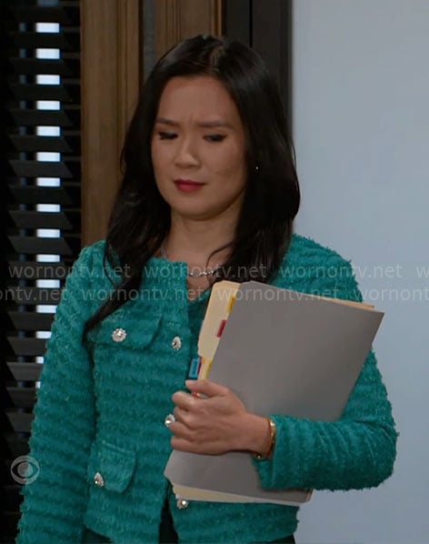 Caroline’s green tweed jacket with jewel buttons on Beyond the Gates