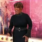 Chandra Wilson’s black studded trim turtleneck dress on Sherri
