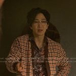 Daniel’s orange check cardigan on Reasonable Doubt