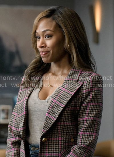 Chris’s grey top and plaid blazer on The Morning Show