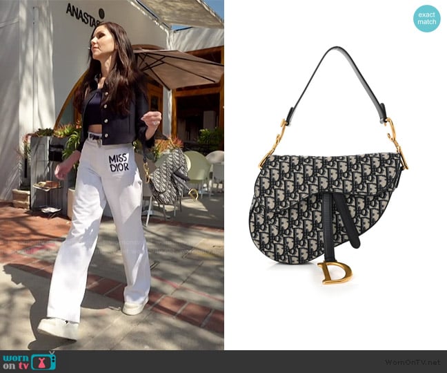 Christian Dior Oblique Saddle Bag Blue worn by Heather Dubrow on The Real Housewives of Orange County